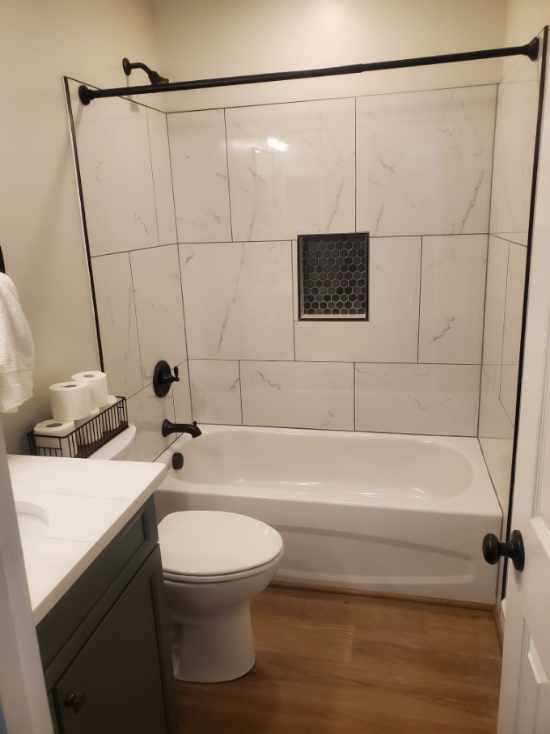 Marble tile tub surround with hex niche - Bradie's Custom Construction, Fredericksburg VA